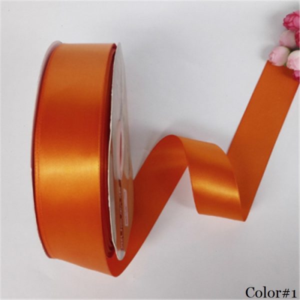 lot of satin ribbon. 1/4 inch wide. Some plain and some edged. Plain are  orange