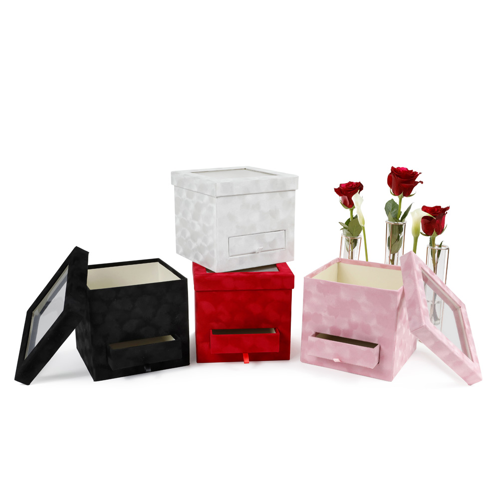 https://unikpackaging.com/wp-content/uploads/2022/04/square-flower-box-large-cylinder-white-black-pink-red-emerald-sage-velvet-velour-gift-birthday-flowers-florist-supplies-floral-bouquet-wrap-paper-packaging-for-arrangement-box-W778.jpg